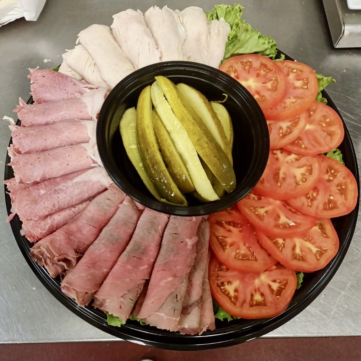 Deli meat and tomato catering platter