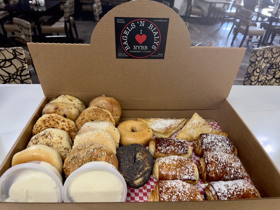 Box of bagels and pastries with the NYBB sticker