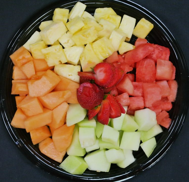 Cut fruit platter with melon and berries