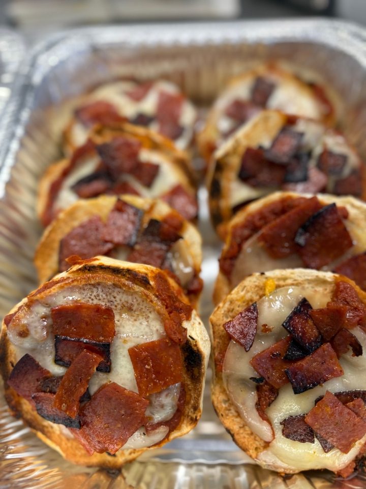 Pizza bagels in a foil tray