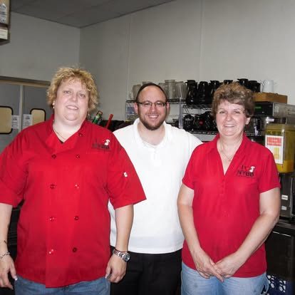 Shelley and Ruth Leatherman with the Rabbi in the kitchen